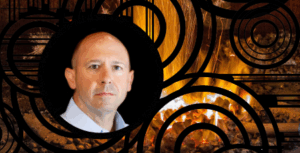 Mike Drout's serious expression and even gaze express his earnestness about academia and his respect for anyone who is challenging themselves wherever they are on their journey. It's a static and dark photo and really does not show us just how kind he is and how much he cares about his students.